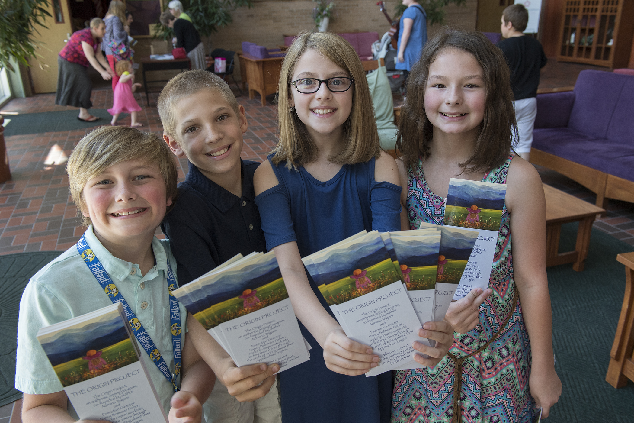 Student writers with their books